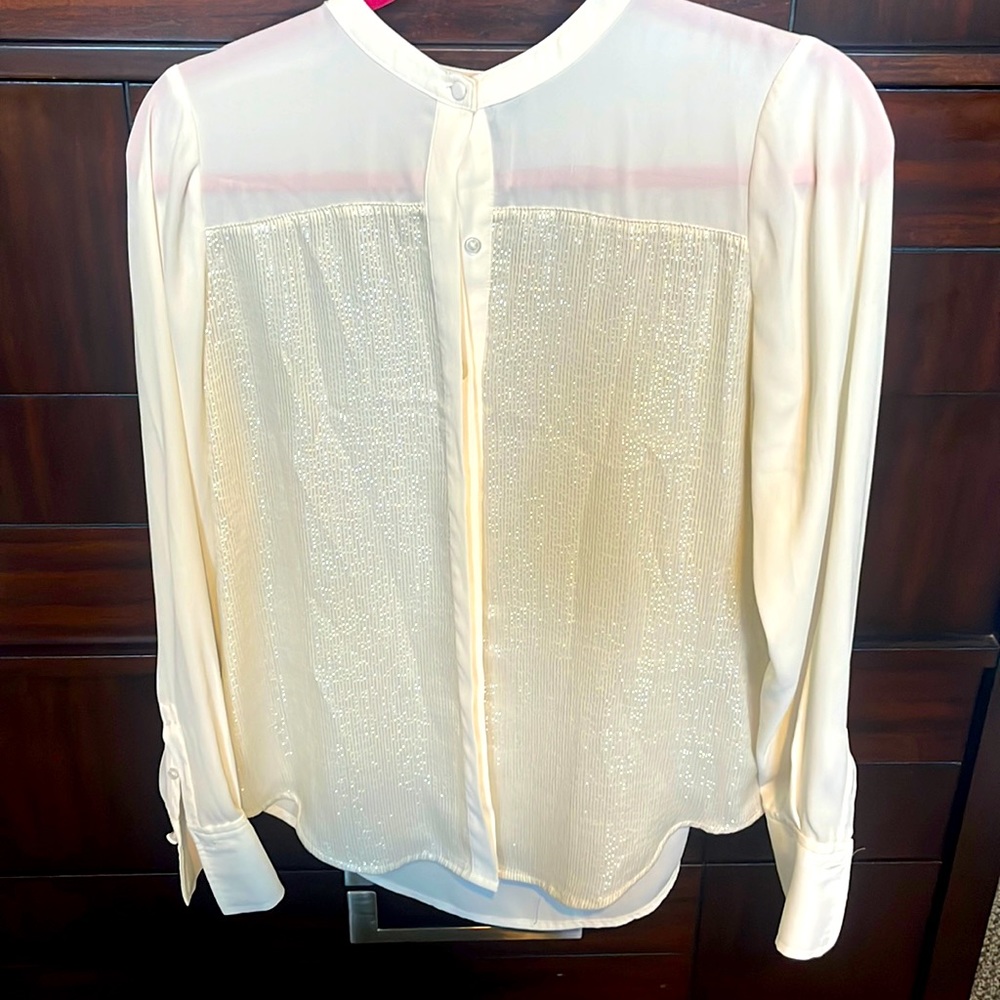 Cream blouse with beautiful silver detail on the blouse